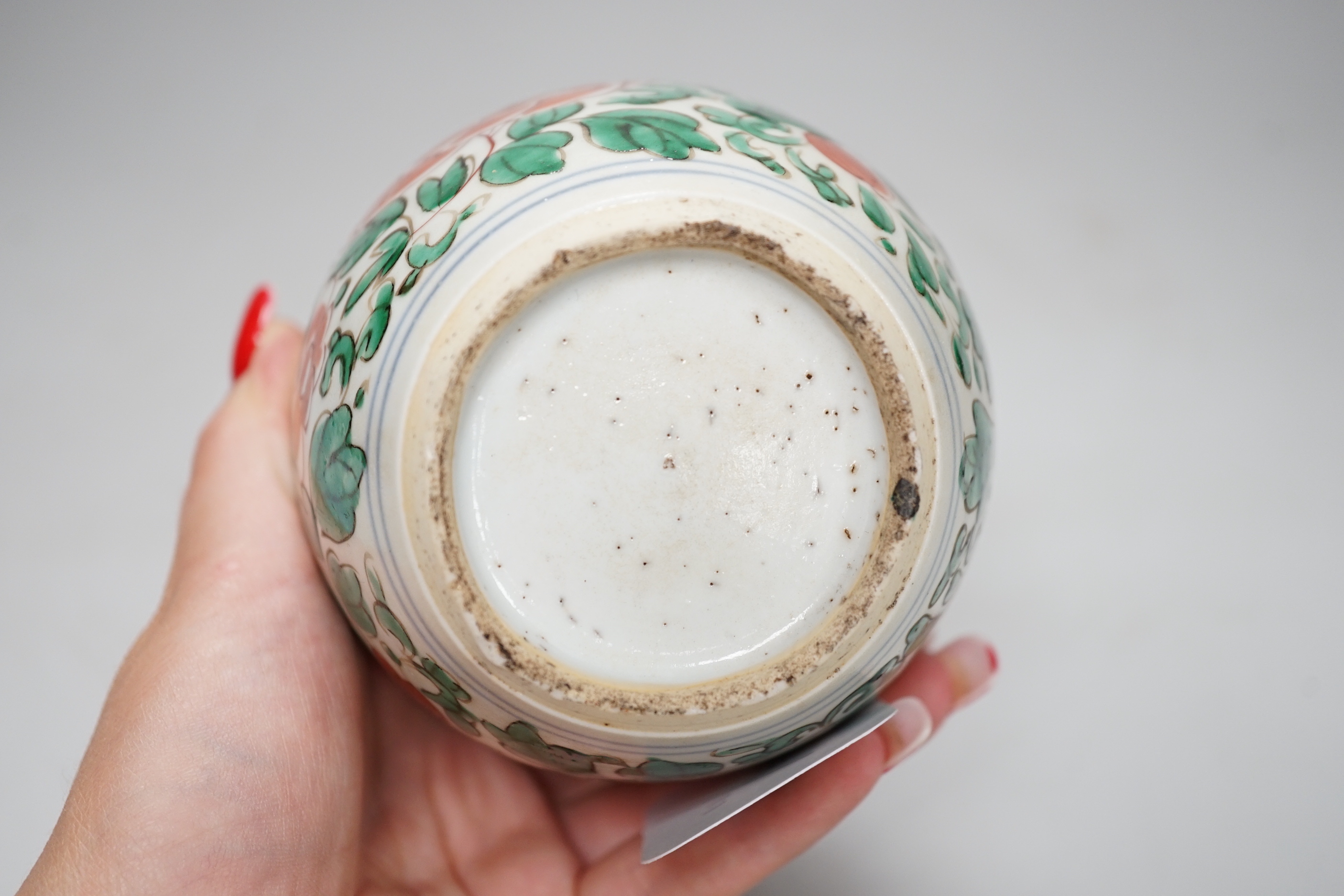 A late 17th century Chinese wucai small jar, 12cm high